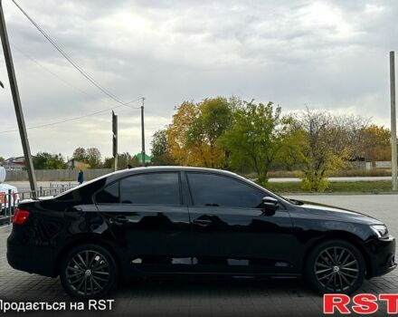 Фольксваген Джетта 2013 в Харькове на Automoto.ua Черный Фольксваген Джетта, объемом двигателя 2.5 л и пробегом 156 тыс. км за 11900 $, фото 3 на Automoto.ua