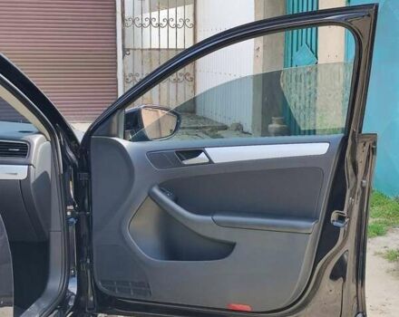 Черный Фольксваген Джетта, объемом двигателя 1.4 л и пробегом 253 тыс. км за 8900 $, фото 7 на Automoto.ua