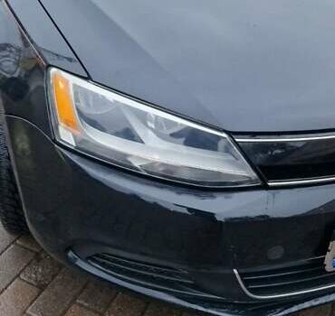 Чорний Фольксваген Джетта, об'ємом двигуна 1.4 л та пробігом 241 тис. км за 8599 $, фото 7 на Automoto.ua