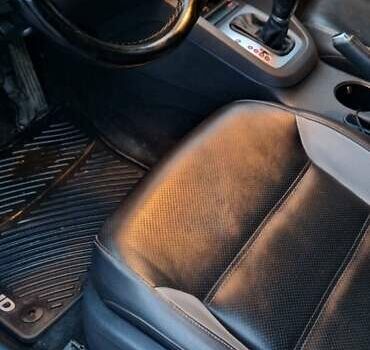 Чорний Фольксваген Джетта, об'ємом двигуна 1.4 л та пробігом 241 тис. км за 8599 $, фото 10 на Automoto.ua