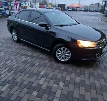 Чорний Фольксваген Джетта, об'ємом двигуна 1.4 л та пробігом 241 тис. км за 8599 $, фото 2 на Automoto.ua