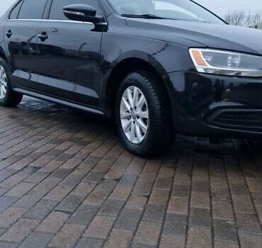 Чорний Фольксваген Джетта, об'ємом двигуна 1.4 л та пробігом 241 тис. км за 8599 $, фото 5 на Automoto.ua