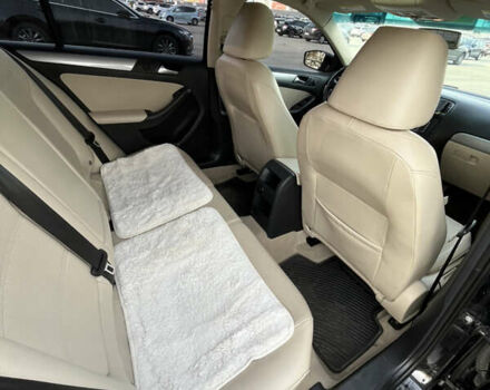 Черный Фольксваген Джетта, объемом двигателя 1.8 л и пробегом 125 тыс. км за 11500 $, фото 11 на Automoto.ua