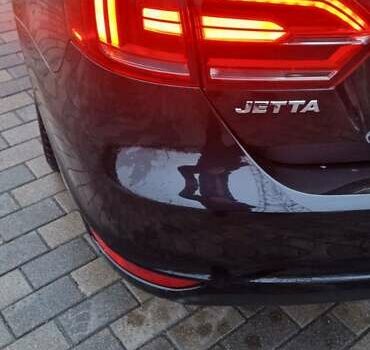 Чорний Фольксваген Джетта, об'ємом двигуна 1.4 л та пробігом 241 тис. км за 8599 $, фото 8 на Automoto.ua