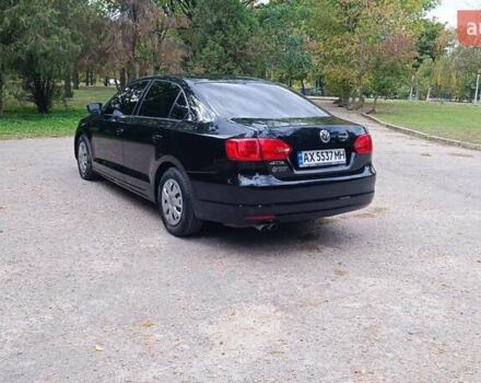 Фольксваген Джетта 2014 у Харкові на Automoto.ua Чорний Фольксваген Джетта, об'ємом двигуна 2 л та пробігом 151 тис. км за 9000 $, фото 10 на Automoto.ua
