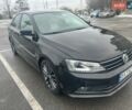 Черный Фольксваген Джетта, объемом двигателя 1.8 л и пробегом 143 тыс. км за 11299 $, фото 1 на Automoto.ua