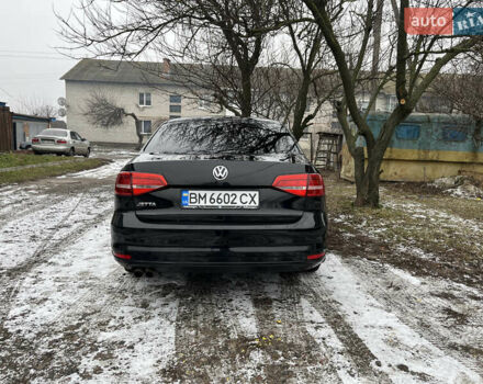 Чорний Фольксваген Джетта, об'ємом двигуна 2 л та пробігом 84 тис. км за 10000 $, фото 6 на Automoto.ua