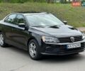 Черный Фольксваген Джетта, объемом двигателя 1.4 л и пробегом 142 тыс. км за 8500 $, фото 1 на Automoto.ua