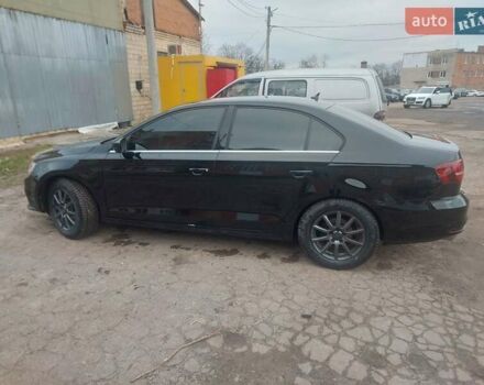 Чорний Фольксваген Джетта, об'ємом двигуна 1.4 л та пробігом 102 тис. км за 11700 $, фото 9 на Automoto.ua