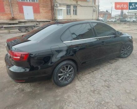 Чорний Фольксваген Джетта, об'ємом двигуна 1.4 л та пробігом 102 тис. км за 11700 $, фото 4 на Automoto.ua