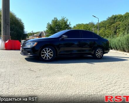 Черный Фольксваген Джетта, объемом двигателя 1.4 л и пробегом 143 тыс. км за 10900 $, фото 1 на Automoto.ua