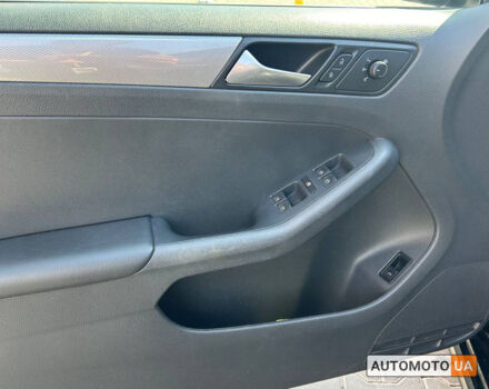 Черный Фольксваген Джетта, объемом двигателя 1.4 л и пробегом 124 тыс. км за 11000 $, фото 6 на Automoto.ua