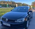 Чорний Фольксваген Джетта, об'ємом двигуна 1.4 л та пробігом 135 тис. км за 11200 $, фото 1 на Automoto.ua