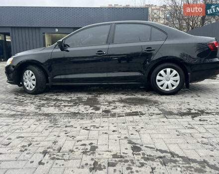 Чорний Фольксваген Джетта, об'ємом двигуна 1.4 л та пробігом 105 тис. км за 10999 $, фото 5 на Automoto.ua