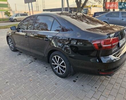 Чорний Фольксваген Джетта, об'ємом двигуна 1.4 л та пробігом 130 тис. км за 10700 $, фото 12 на Automoto.ua