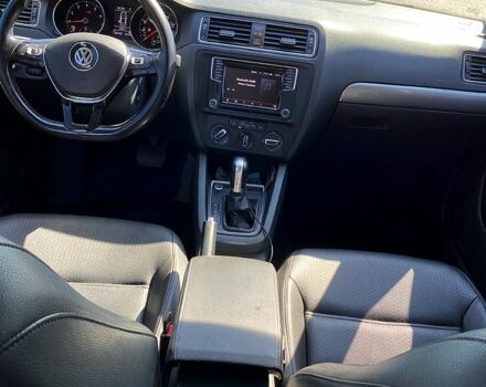 Черный Фольксваген Джетта, объемом двигателя 1.4 л и пробегом 143 тыс. км за 10900 $, фото 5 на Automoto.ua