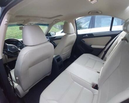 Чорний Фольксваген Джетта, об'ємом двигуна 1.4 л та пробігом 105 тис. км за 10673 $, фото 6 на Automoto.ua