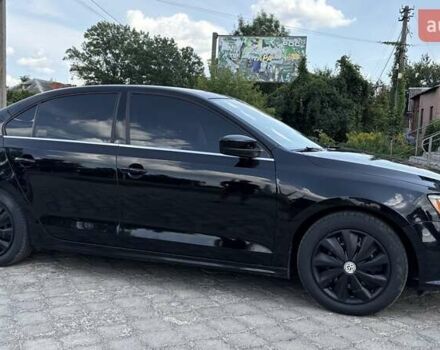 Чорний Фольксваген Джетта, об'ємом двигуна 1.4 л та пробігом 182 тис. км за 10200 $, фото 1 на Automoto.ua