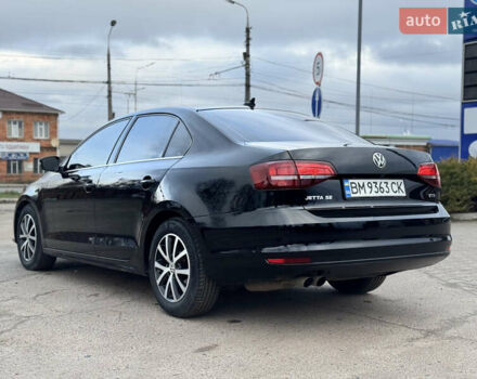 Черный Фольксваген Джетта, объемом двигателя 1.4 л и пробегом 80 тыс. км за 12200 $, фото 4 на Automoto.ua