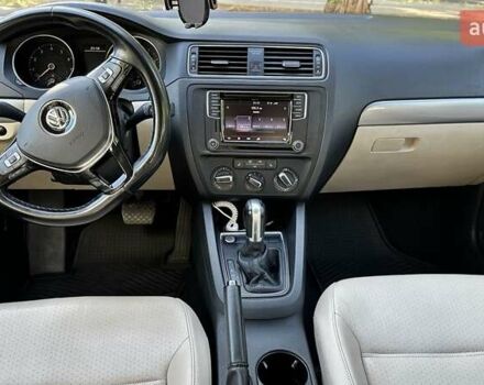 Чорний Фольксваген Джетта, об'ємом двигуна 1.4 л та пробігом 142 тис. км за 10500 $, фото 6 на Automoto.ua