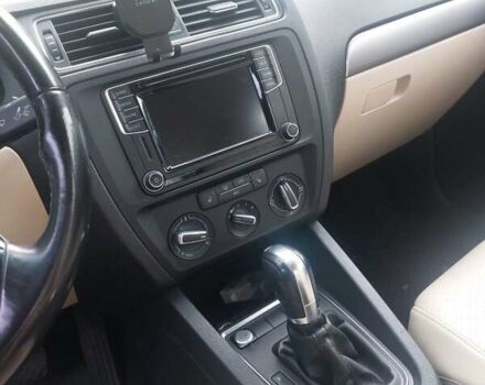 Чорний Фольксваген Джетта, об'ємом двигуна 1.4 л та пробігом 105 тис. км за 10673 $, фото 3 на Automoto.ua