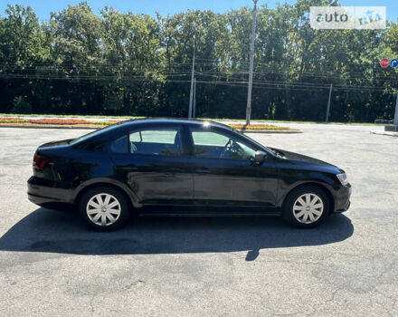 Черный Фольксваген Джетта, объемом двигателя 1.39 л и пробегом 150 тыс. км за 8500 $, фото 1 на Automoto.ua