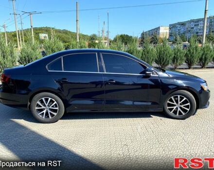 Черный Фольксваген Джетта, объемом двигателя 1.4 л и пробегом 143 тыс. км за 10900 $, фото 3 на Automoto.ua