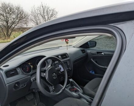 Черный Фольксваген Джетта, объемом двигателя 1.4 л и пробегом 85 тыс. км за 10500 $, фото 7 на Automoto.ua