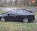 Черный Фольксваген Джетта, объемом двигателя 1.8 л и пробегом 180 тыс. км за 9800 $, фото 1 на Automoto.ua