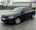 Черный Фольксваген Джетта, объемом двигателя 1.4 л и пробегом 148 тыс. км за 10500 $, фото 1 на Automoto.ua