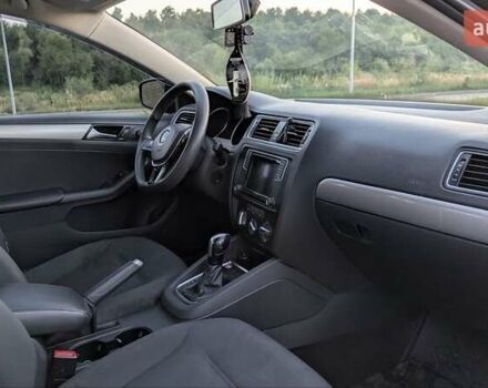 Чорний Фольксваген Джетта, об'ємом двигуна 1.4 л та пробігом 170 тис. км за 10200 $, фото 14 на Automoto.ua