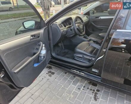 Чорний Фольксваген Джетта, об'ємом двигуна 1.4 л та пробігом 130 тис. км за 10700 $, фото 5 на Automoto.ua