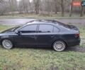 Черный Фольксваген Джетта, объемом двигателя 1.8 л и пробегом 180 тыс. км за 12800 $, фото 1 на Automoto.ua