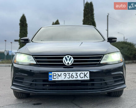 Черный Фольксваген Джетта, объемом двигателя 1.4 л и пробегом 80 тыс. км за 12200 $, фото 1 на Automoto.ua