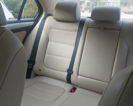 Чорний Фольксваген Джетта, об'ємом двигуна 1.4 л та пробігом 105 тис. км за 10673 $, фото 4 на Automoto.ua