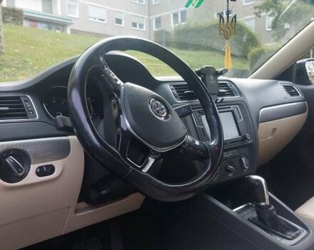 Чорний Фольксваген Джетта, об'ємом двигуна 1.4 л та пробігом 105 тис. км за 10673 $, фото 2 на Automoto.ua