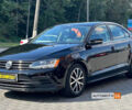 Черный Фольксваген Джетта, объемом двигателя 1.4 л и пробегом 124 тыс. км за 11000 $, фото 2 на Automoto.ua