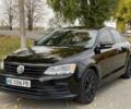 Фольксваген Джетта 2016 в Днепре (Днепропетровске) на Automoto.ua Черный Фольксваген Джетта, объемом двигателя 1.4 л и пробегом 128 тыс. км за 10500 $, фото 4 на Automoto.ua