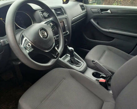 Черный Фольксваген Джетта, объемом двигателя 1.4 л и пробегом 99 тыс. км за 9800 $, фото 6 на Automoto.ua