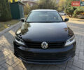Черный Фольксваген Джетта, объемом двигателя 1.39 л и пробегом 99 тыс. км за 11300 $, фото 1 на Automoto.ua