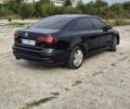 Чорний Фольксваген Джетта, об'ємом двигуна 1.4 л та пробігом 90 тис. км за 10300 $, фото 5 на Automoto.ua