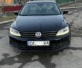 Чорний Фольксваген Джетта, об'ємом двигуна 1.4 л та пробігом 110 тис. км за 11500 $, фото 1 на Automoto.ua