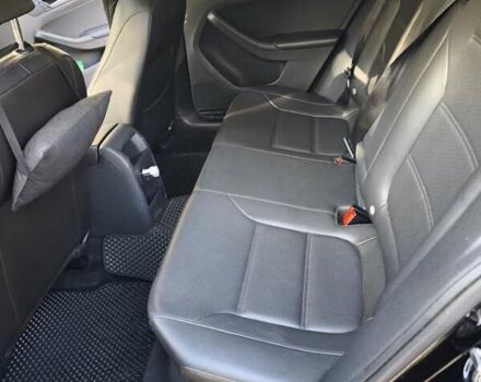 Черный Фольксваген Джетта, объемом двигателя 1.4 л и пробегом 89 тыс. км за 11400 $, фото 2 на Automoto.ua