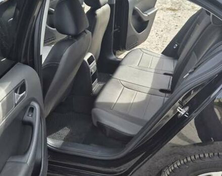 Чорний Фольксваген Джетта, об'ємом двигуна 1.4 л та пробігом 90 тис. км за 10700 $, фото 10 на Automoto.ua