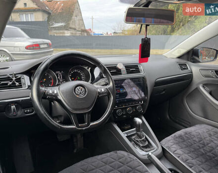 Черный Фольксваген Джетта, объемом двигателя 1.4 л и пробегом 151 тыс. км за 11000 $, фото 27 на Automoto.ua