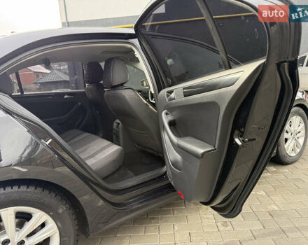 Черный Фольксваген Джетта, объемом двигателя 1.4 л и пробегом 151 тыс. км за 11000 $, фото 31 на Automoto.ua