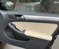 Черный Фольксваген Джетта, объемом двигателя 1.4 л и пробегом 160 тыс. км за 11990 $, фото 19 на Automoto.ua