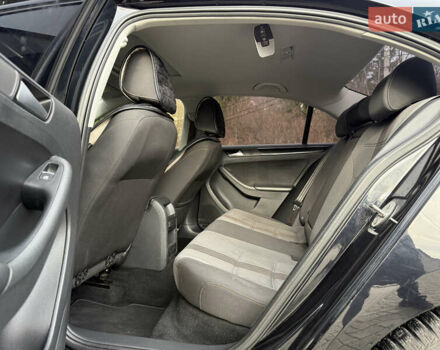 Черный Фольксваген Джетта, объемом двигателя 1.4 л и пробегом 151 тыс. км за 11000 $, фото 42 на Automoto.ua