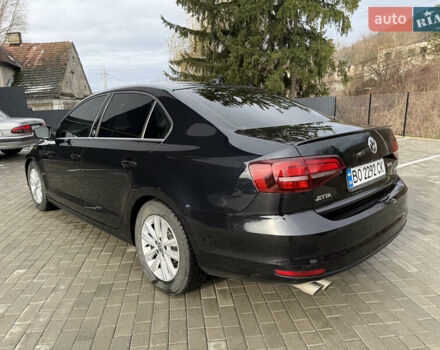 Черный Фольксваген Джетта, объемом двигателя 1.4 л и пробегом 151 тыс. км за 11000 $, фото 7 на Automoto.ua