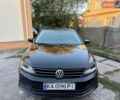 Черный Фольксваген Джетта, объемом двигателя 1.39 л и пробегом 153 тыс. км за 10500 $, фото 1 на Automoto.ua